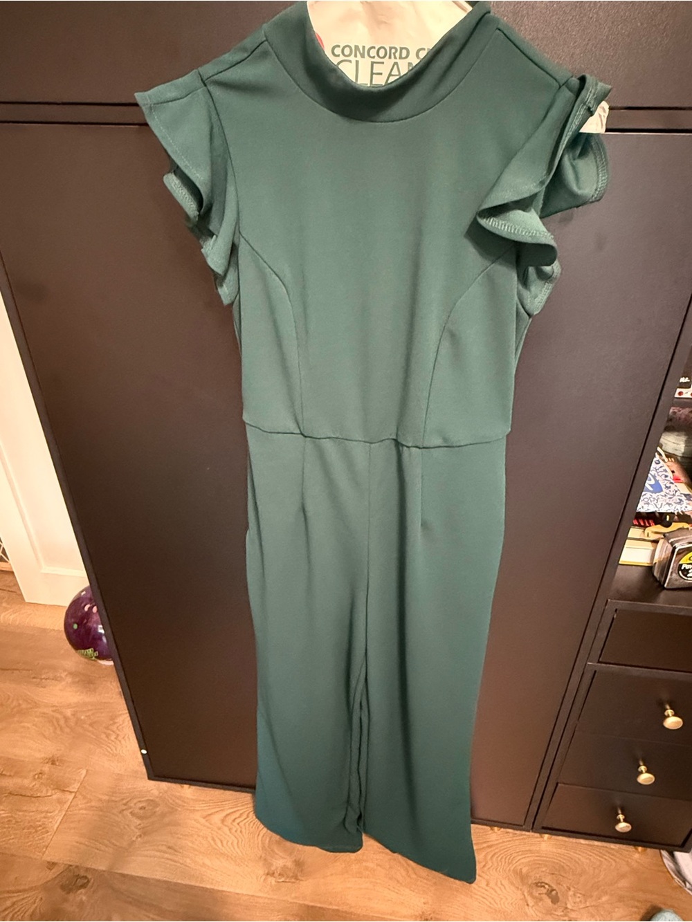 Blue Rain Brand from Francesca’s dark teal Ruffled Sleeve Jumpsuit